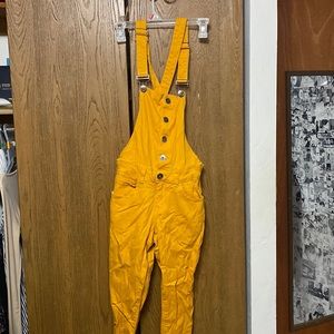 yellow overalls